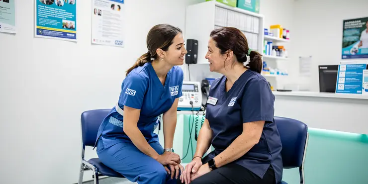 How can community helpers access emergency assistance?